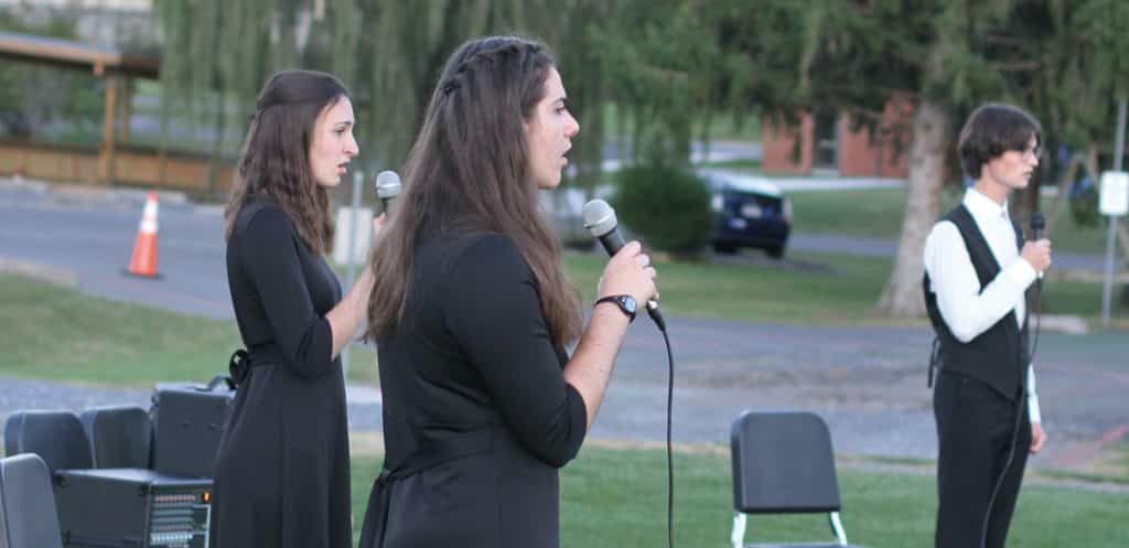 Touring Choir sang outdoors for parents, faculty and staff one time in fall 2020. The usual process and cycle of choirs was adjusted due to COVID.