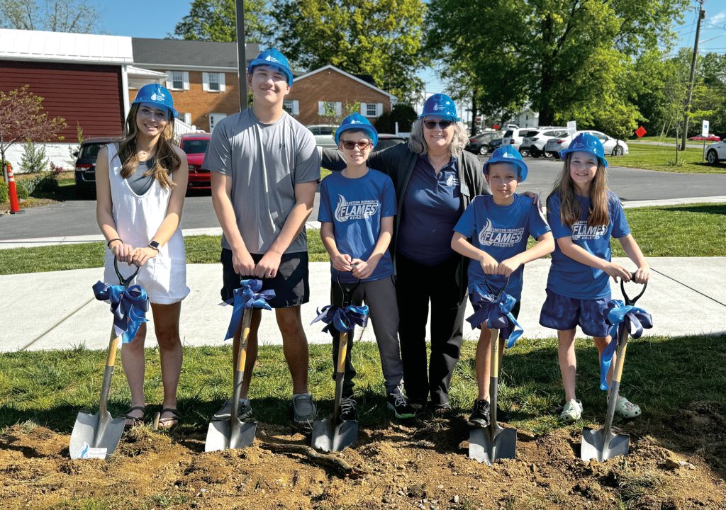 Maria Archer with EMS students during ground breaking