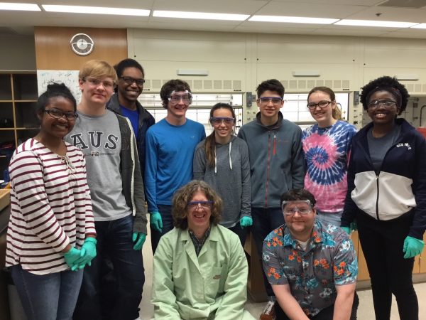 Rahel Lema, Lukas Early, JMU teachers assistant (name not available), Cyrus Ramsey, Ava Galgano, Victor Pou, Samantha Forbes, Virtue Adowei. Front, JMU chemistry professor Kevin L. Caran, PhD, and EMHS teacher, Kevin Carini.