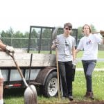 Gift and Thrift mulching. Pictured, left, is Dennis Brubaker, who taught for 33 years at EMS and now is a steady volunteer at Gift and Thrift.