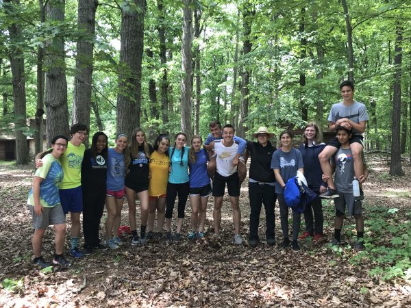 Track and Field team volunteers at Massanutta Springs as part of Community Service Day.