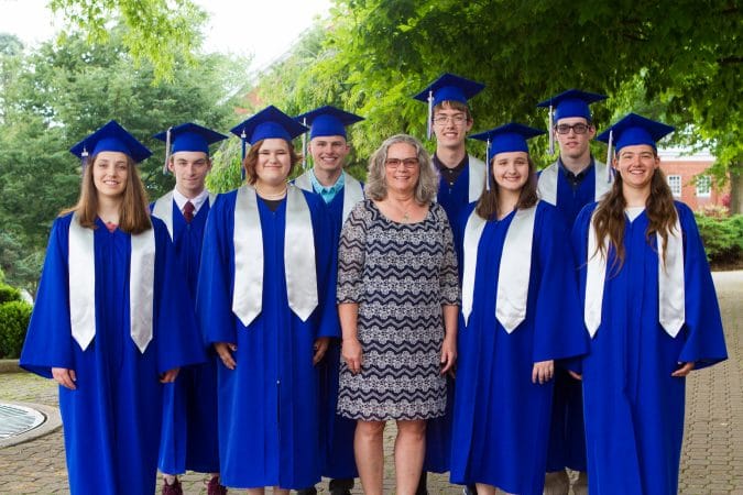 Maria Archer with class of 2019 members who attended Eastern Mennonite Elementary School