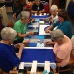 Volunteers -- including aunts, grandmothers, mothers and friends of current students -- helped with the quilting on History Day 2017