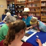 Volunteers -- including aunts, grandmothers, mothers and friends of current students -- helped with the quilting on History Day 2017