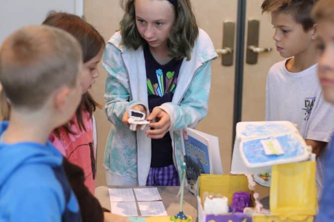 EMES 5th graders share projects with younger classes