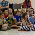 EMES Gathering as children prepare to sign the annual Peace Pledge