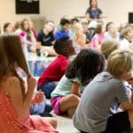 EMES Gathering as children prepare to sign the annual Peace Pledge