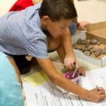 EMES Gathering as children sign the annual Peace Pledge