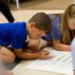 EMES Gathering as children sign the annual Peace Pledge