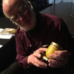 Earl Martin shows a munition casing like those left in the ground, sometimes unexploded, many years after the war. Photo by Kathleen Shaw.