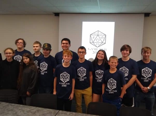 Mason Ritchie '23, second from back on the right, and his teammates who took third in the 2019 Game Jam coding event at JMU.