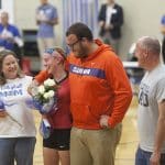 Joshua Stapleton '18, surprised is sister Abby '20, for senior day