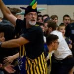 Holding back the Wildfire fan section at the VISAA quarterfinal match