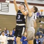 EMHS guard Chance Church drives for a score against Covenant in the Virginia Independent Conference championship game Feb. 22 at Roanoke College. Photo by Lori Smith '94 Hatter (mother of players Adam '21 and Drew '24)
