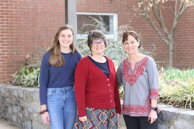 Miriam Rhodes '23, Regina Chacha and Laura Rhodes.