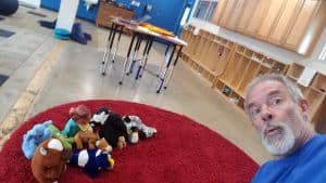 Kendal Bauman filming an elementary PE lesson with his animal friends