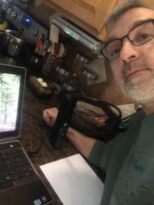 Lee Good, science teacher, in his home office/kitchen