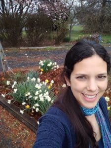 Claudia Fencer, biology teacher, recording bird songs  for class. She wonders: Did you know that in these two months baby birds learn how to sing?