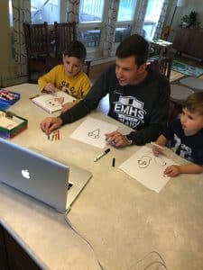 Andrew Gascho, athletic director and girls varsity soccer coach (and EMES dad), doing an online team building activity with the team before the season was cancelled.