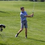 Ben Bellamy '22 watches his chip in a 2019 match.