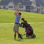 Grady McGloughlin '22, eyes his shot in a 2019 match.