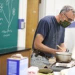 Lee Good, making tin cloth for a distance learning video lesson