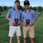 Meade Slonaker '20 and Adam Hatter '22, with their 2019 1st Team VIC Plaques