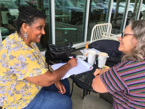 Debbie Katz, high school counselor, and Maria Archer, then K-8 principal, plan for a meeting of the Racial Equity Working Group