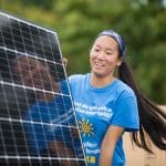 Eastern Mennonite University students help to install solar panels on a second campus installation in October 2018. Photo courtesy of Eastern Mennonite University.