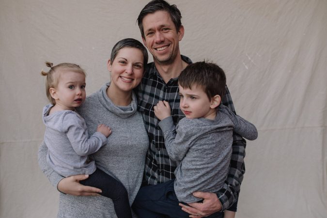 Andrew Jenner '00, Community Engagement Award in 2020, with Rachel and their children.