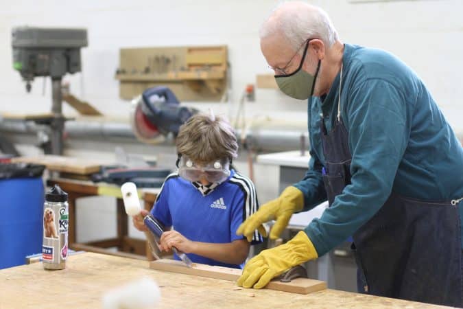 Brent Holl and the 5th grade build a marimba.