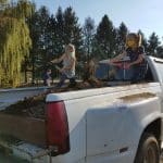 Shoveling topsoil for the bridge garden