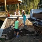 Spreading topsoil by the bridge