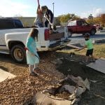 Spreading topsoil by the bridge