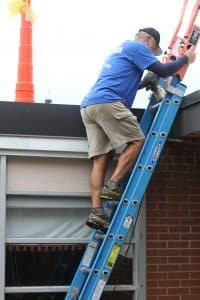 Kendal Bauman, elementary PE teacher, heads up to the roof