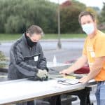 Volunteers at the solar barn raising