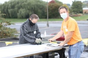 Volunteers at the solar barn raising