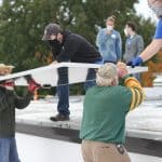 Volunteers at the solar barn raising