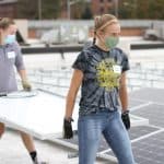 Sidney Rhodes'22 and Karla Hostetter '21, EMS Sustainablity club members at the solar barn raising