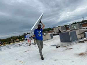 Joshua Kraybill '10, Got Electric at the solar barn raising