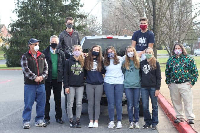 Left to right, Luke Schrock-Hurst (Mennonite Central Committee), and National Honor Society club: Elwood Yoder (sponsor), Lleyton Stutzman '21, Jenna Weaver '21, Shay Bechler '21, Anna Tieszen '21, Halie Mast  '21, Adam Stoltzfus '21, Karla Hostetter '21 and Kevin Carini (sponsor)