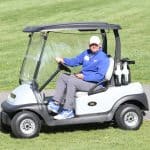 Diana Berkshire keeps an eye on the hole-in-one $10,000 prize winning hole (no winner!)