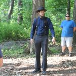 Sam Funk, director of the Brethren and Mennonite Heritage Center talks to students during Community Service Day