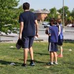 Eighth grade helps with games at elementary field day