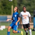 Eli Stoll under pressure from Hargrave's Chiduben Anyanwe. Photo by Daniel Lin/DN-R