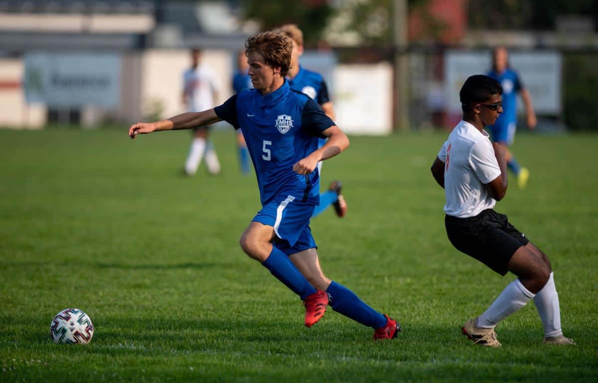 Ezra Miller '22 blows past a Hargrave defender. Photo by Daniel Lin/DN-R