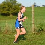 Ila Hackman '28, Peak View cross country invitational 2021. Photo by Michael Weaver.