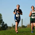 Martha Wyse '26 , Peak View cross country invitational 2021. Photo by Michael Weaver.