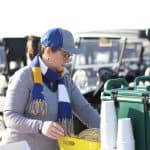 Erin Kennedy Hess, advancement assistant, makes sure the all-important coffee is ready by 7:30