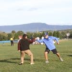 Caleb Schrock-Hurst fit bumps Coach Bauman after making a penalty kick at half time